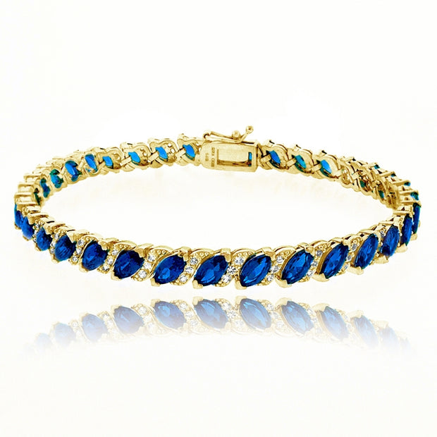 Yellow Gold Flashed Sterling Silver Created Blue Sapphire Marquise-cut 6x3mm Tennis Bracelet with White Topaz Accents