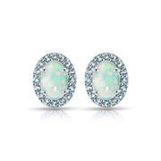 Sterling Silver Created White Opal and Blue Topaz Oval Halo Stud Earrings
