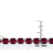 Sterling Silver 40ct Created Ruby 9x7mm Oval Tennis Bracelet