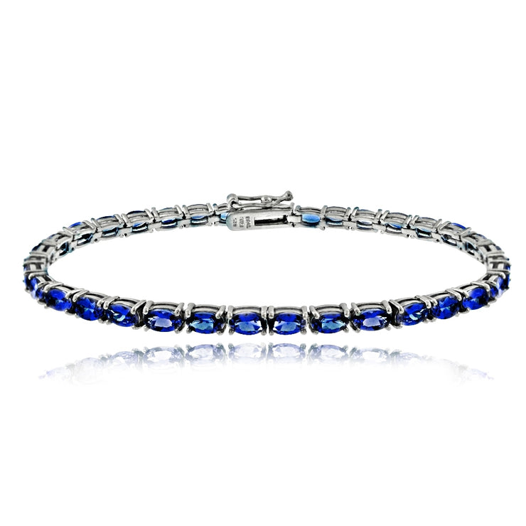 Sterling Silver 6.2ct Created Blue Sapphire 5x3mm Oval Tennis Bracelet