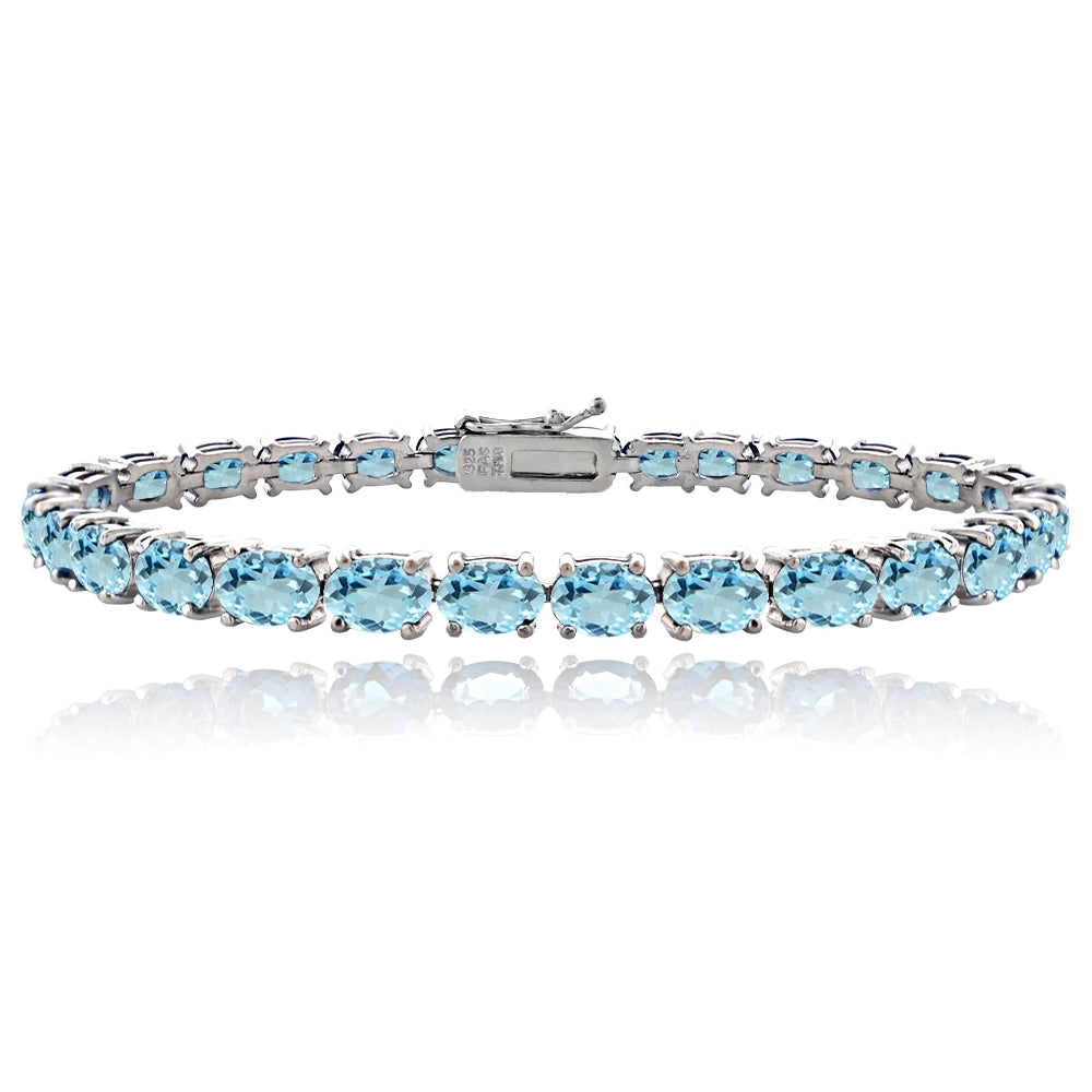 Sterling Silver 14.4ct Blue Topaz 6x4mm Oval Tennis Bracelet