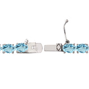Sterling Silver 14.4ct Blue Topaz 6x4mm Oval Tennis Bracelet
