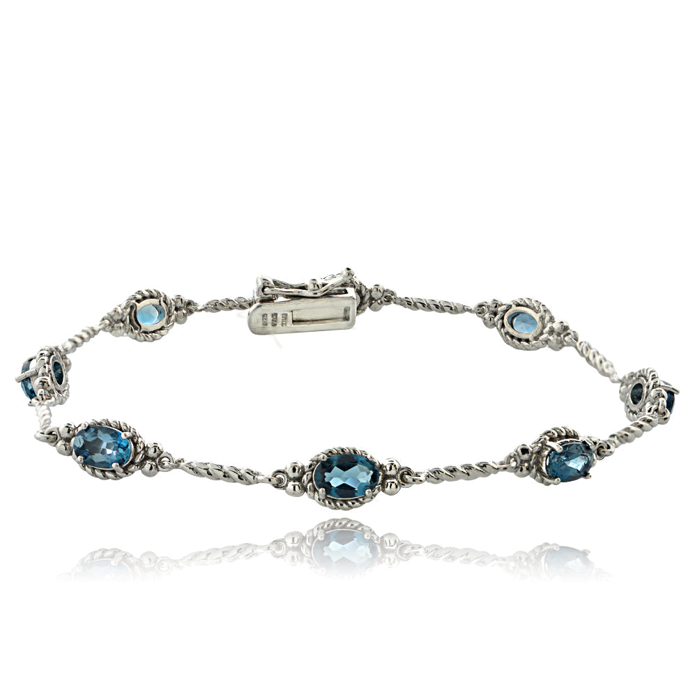 Sterling Silver 4ct TGW Oval London Blue Topaz Braided Link Bracelet