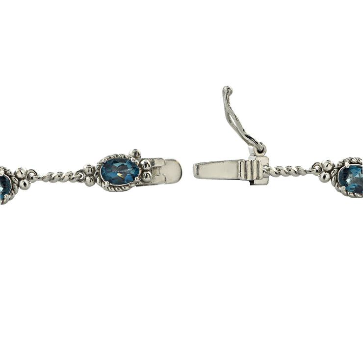 Sterling Silver 4ct TGW Oval London Blue Topaz Braided Link Bracelet