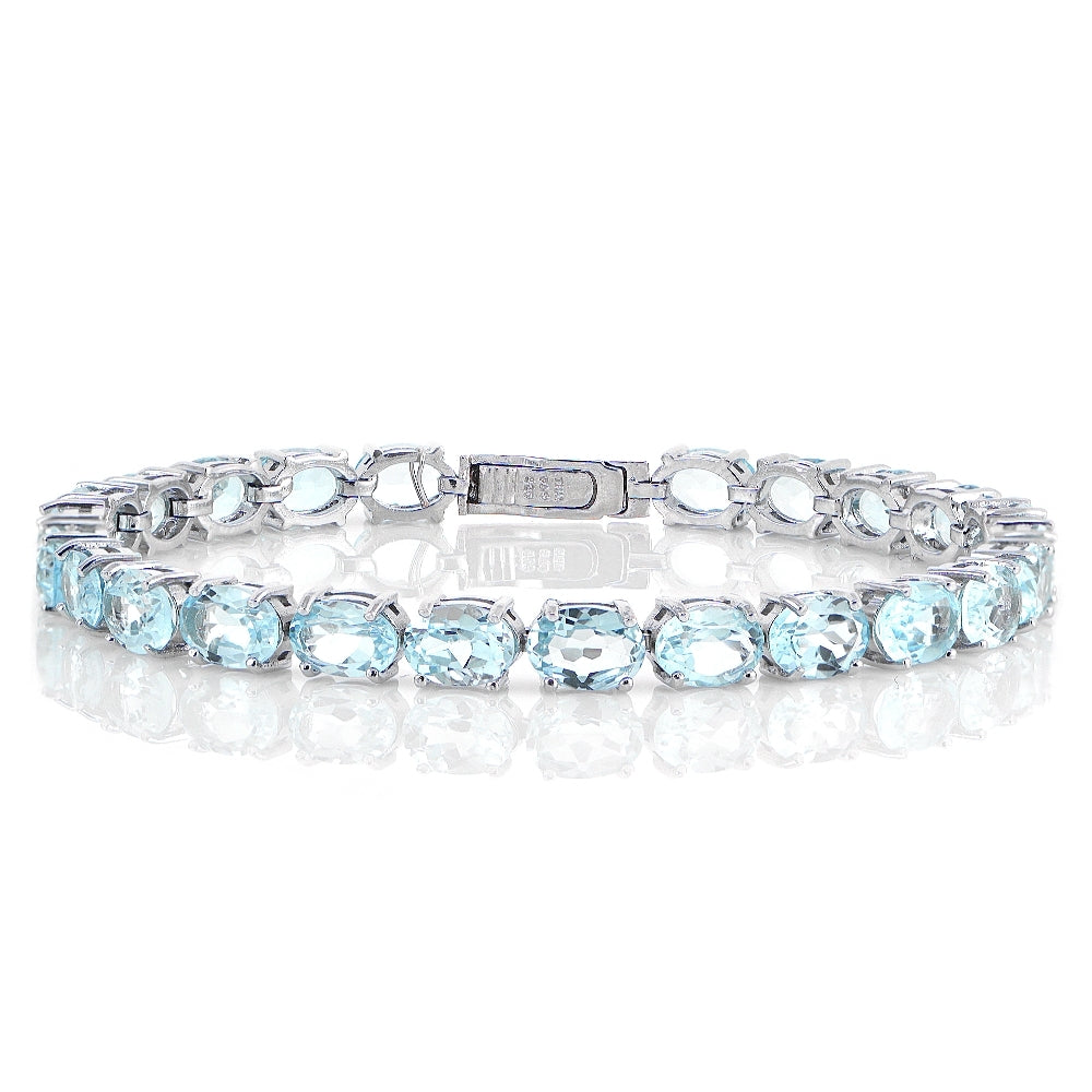 Sterling Silver 19.35ct Blue Topaz 7x5mm Oval Tennis Bracelet