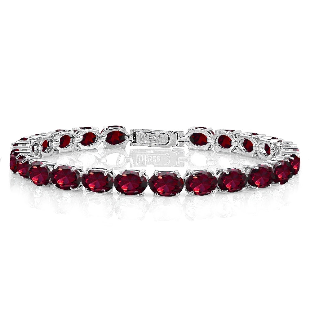 Sterling Silver 22ct Created Ruby 7x5mm Oval Tennis Bracelet