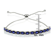 Sterling Silver 5x3mm Created Blue Sapphire Oval-Cut Adjustable Bracelet