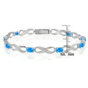 Sterling Silver Created Blue Opal and Diamond Accent Infinity Link Bracelet