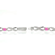 Sterling Silver Created Pink Opal and Diamond Accent Infinity Link Bracelet