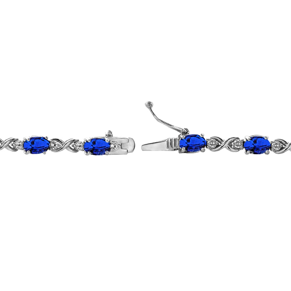 Sterling Silver Created Blue Sapphire 6x4mm Oval Infinity Bracelet with White Topaz Accents-2
