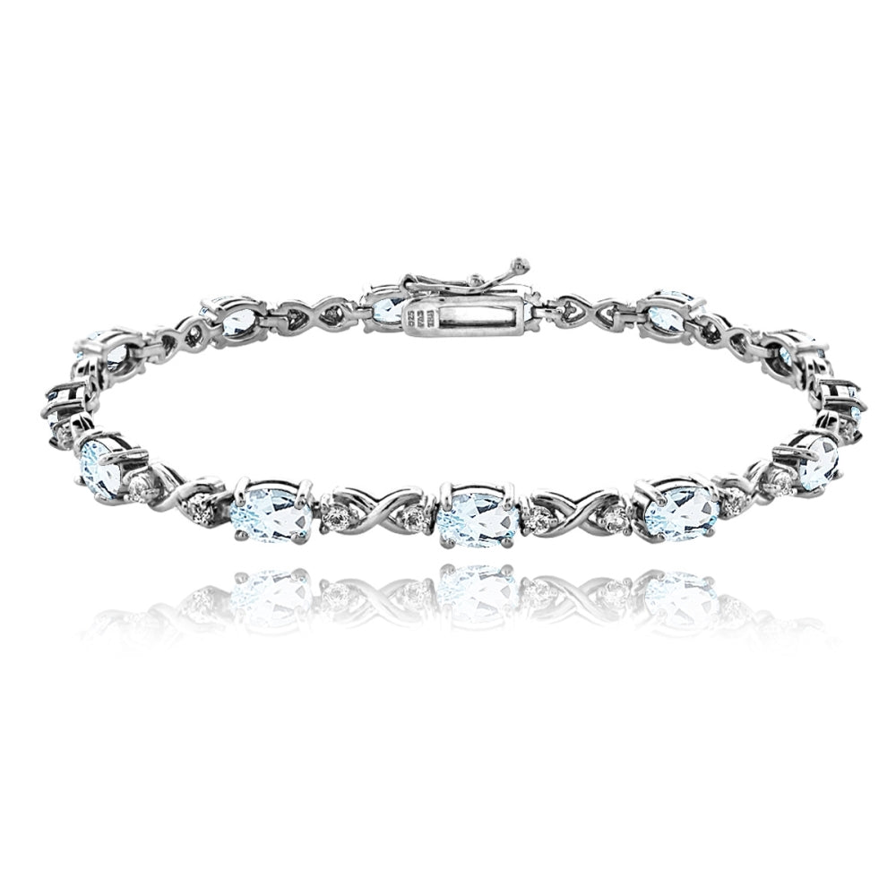 Sterling Silver Blue Topaz 6x4mm Oval Infinity Bracelet with White Topaz Accents