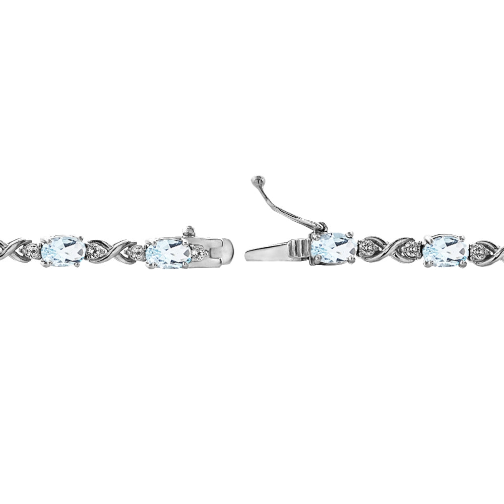 Sterling Silver Blue Topaz 6x4mm Oval Infinity Bracelet with White Topaz Accents-2