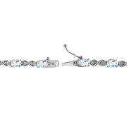 Sterling Silver Blue Topaz 6x4mm Oval Infinity Bracelet with White Topaz Accents
