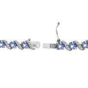 Sterling Silver Tanzanite 4mm Round-Cut S Design Tennis Bracelet with White Topaz Accents