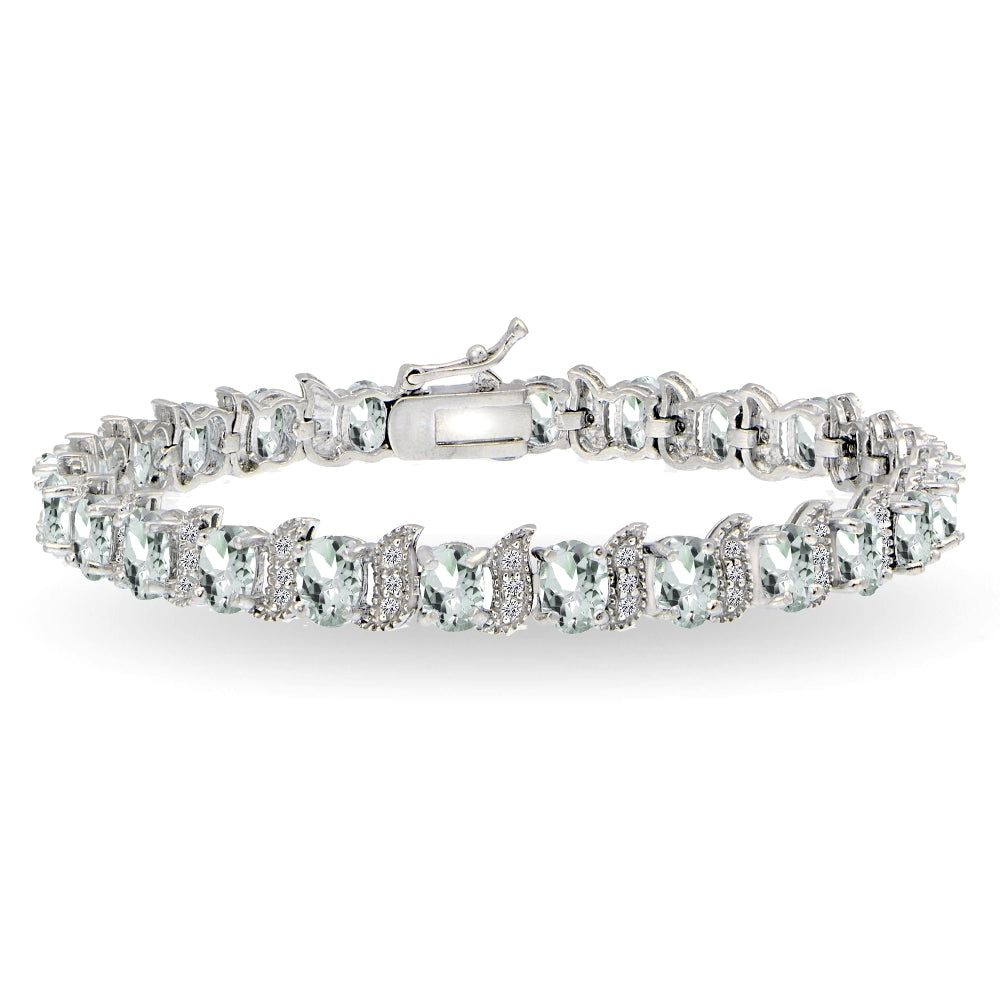 Sterling Silver Aquamarine 6x4mm Oval and S Tennis Bracelet with White Topaz Accents