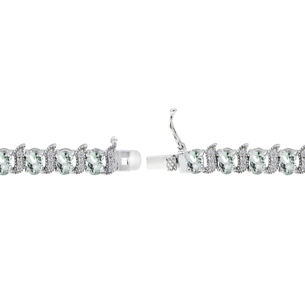 Sterling Silver Aquamarine 6x4mm Oval and S Tennis Bracelet with White Topaz Accents