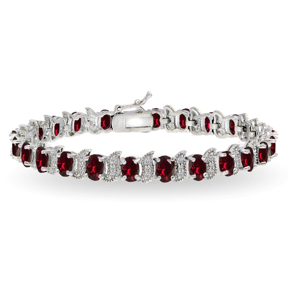 Sterling Silver Created Ruby 6x4mm Oval and S Tennis Bracelet with White Topaz Accents