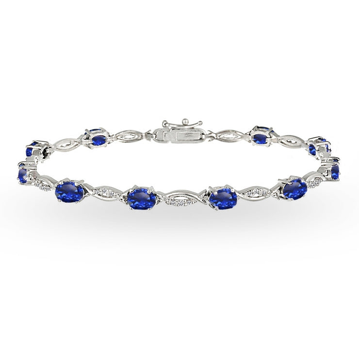 Sterling Silver Created Blue Sapphire and White Topaz Oval-Cut Swirl Tennis Bracelet