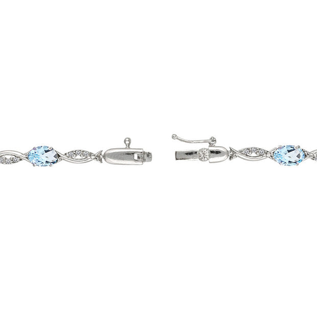 Sterling Silver Blue and White Topaz Oval-Cut Swirl Tennis Bracelet