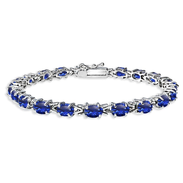 Sterling Silver Polished Created Blue Sapphire 6x4mm Oval-cut Link Tennis Bracelet