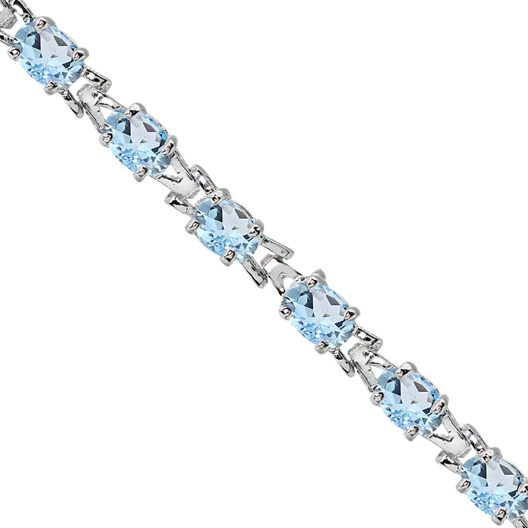 Sterling Silver Polished Blue Topaz 6x4mm Oval-cut Link Tennis Bracelet