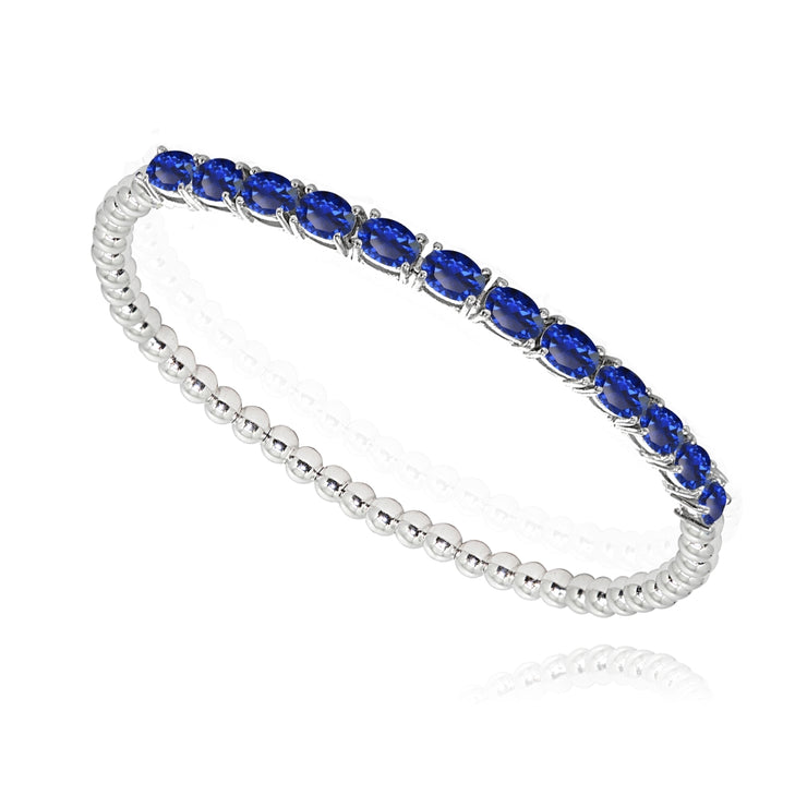 Sterling Silver Created Blue Sapphire Oval Beaded Stretch Tennis Style Bracelet