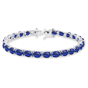 Sterling Silver 7x5mm Created Blue Sapphire Oval-cut Classic Tennis Bracelet