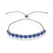 Sterling Silver Blue 6x4mm Oval-Cut Pull-String Adjustable Bolo Bracelet Made with Swarovski Crystals