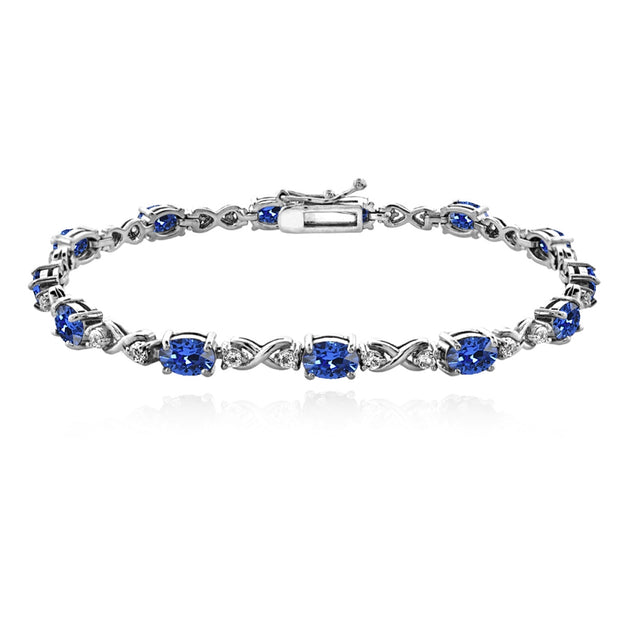 Sterling Silver Blue 6x4mm Oval Infinity Bracelet Made with Swarovski Crystals