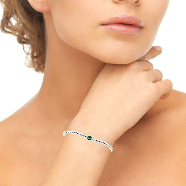 Sterling Silver Polished Beads Stretch Bracelet Made with Green Swarovski Crystal