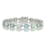 Sterlilng Silver Blue Topaz and Created White Opal 7x5mm Oval-Cut Tennis Bracelet