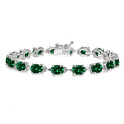 Sterling Silver Created Emerald 7x5mm Oval Classic Link Tennis Bracelet