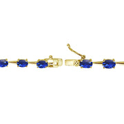 Yellow Gold Flashed Sterling Silver Created Blue Sapphire 6x4mm Oval Classic Link Tennis Bracelet