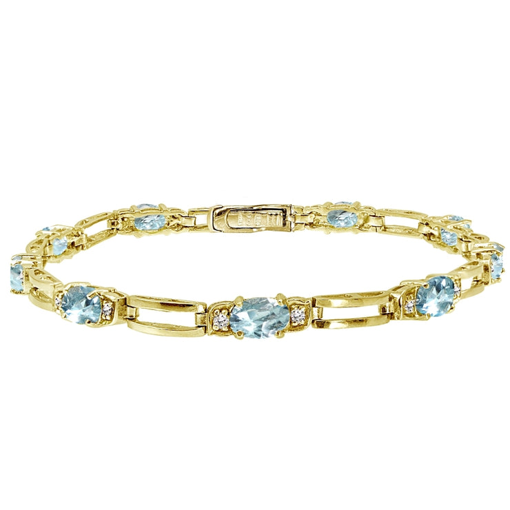 Yellow Gold Flashed Sterling Silver Blue Topaz and Cubic Zirconia Oval & Bar Link Bracelet