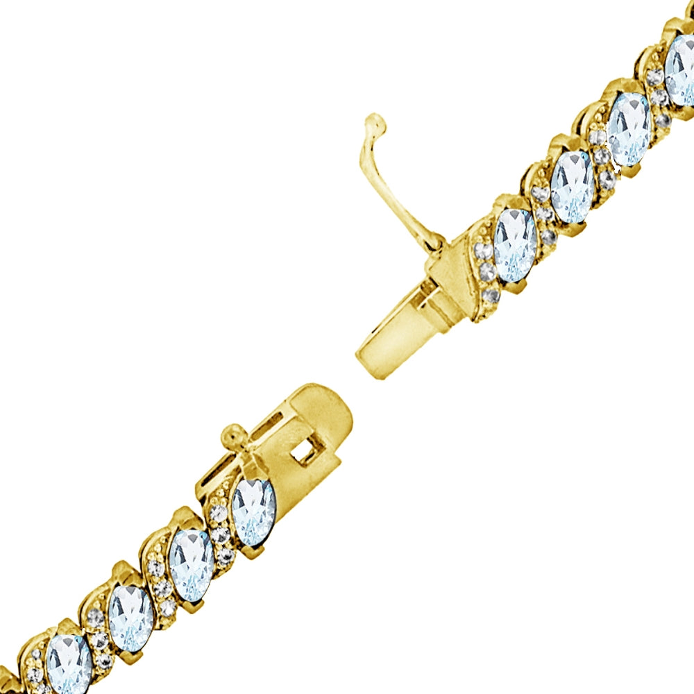 Yellow Gold Flashed Sterling Silver Blue Topaz Marquise-cut 6x3mm Tennis Bracelet with White Topaz Accents-3