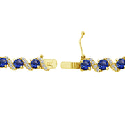 Yellow Gold Flashed Sterling Silver Created Blue Sapphire 4mm Round-Cut S Design Tennis Bracelet with White Topaz Accents