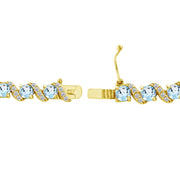 Yellow Gold Flashed Sterling Silver Blue Topaz 4mm Round-Cut S Design Tennis Bracelet with White Topaz Accents