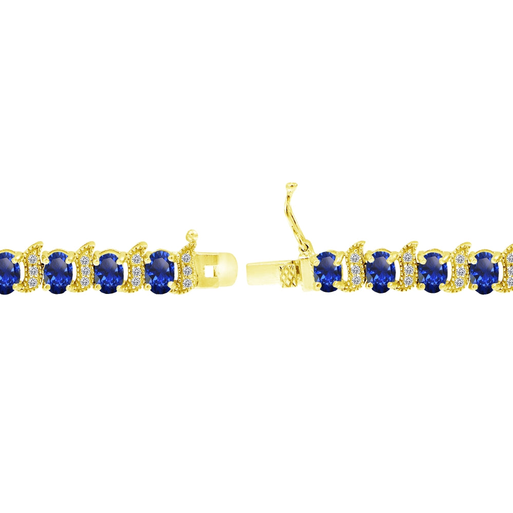 Yellow Gold Flashed Sterling Silver Created Blue Sapphire 6x4mm Oval and S Tennis Bracelet with White Topaz Accents-2