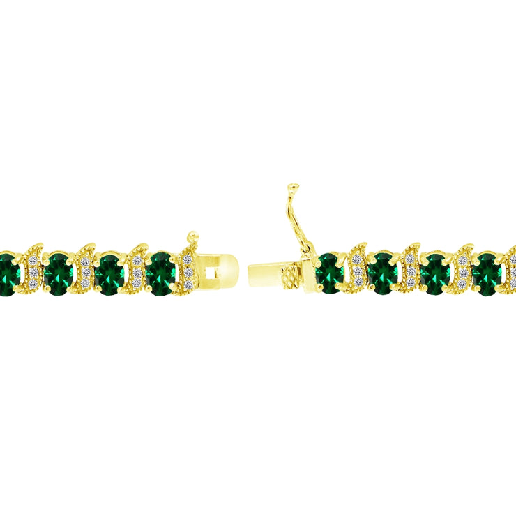 Yellow Gold Flashed Sterling Silver Created Emerald 6x4mm Oval and S Tennis Bracelet with White Topaz Accents