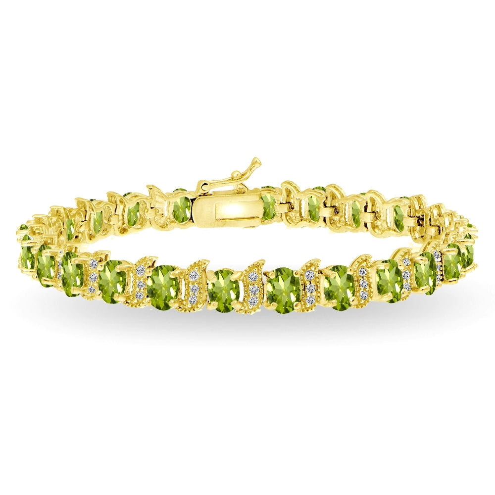Yellow Gold Flashed Sterling Silver Peridot 6x4mm Oval and S Tennis Bracelet with White Topaz Accents