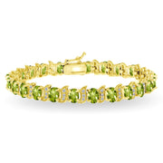 Yellow Gold Flashed Sterling Silver Peridot 6x4mm Oval and S Tennis Bracelet with White Topaz Accents