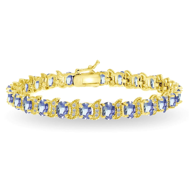 Yellow Gold Flashed Sterling Silver Tanzanite 6x4mm Oval and S Tennis Bracelet with White Topaz Accents