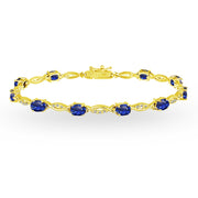Yellow Gold Flashed Sterling Silver Created Blue Sapphire and White Topaz Oval-Cut Swirl Tennis Bracelet