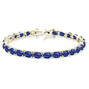 Yellow Gold Flashed Sterling Silver 7x5mm Created Blue Sapphire Oval-cut Classic Tennis Bracelet