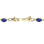 Yellow Gold Flashed Sterling Silver Created Blue Sapphire Oval Polished Infinity Classic Tennis Bracelet
