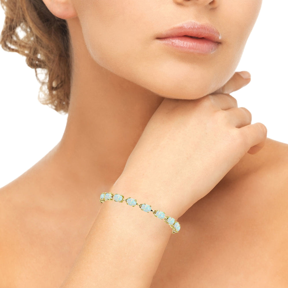 Yellow Gold Flashed Sterling Silver Created White Opal 7x5mm Oval Classic Link Tennis Bracelet-3