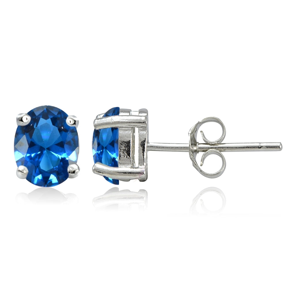 Sterling Silver Created London Blue Topaz 7x5mm Oval Stud Earrings