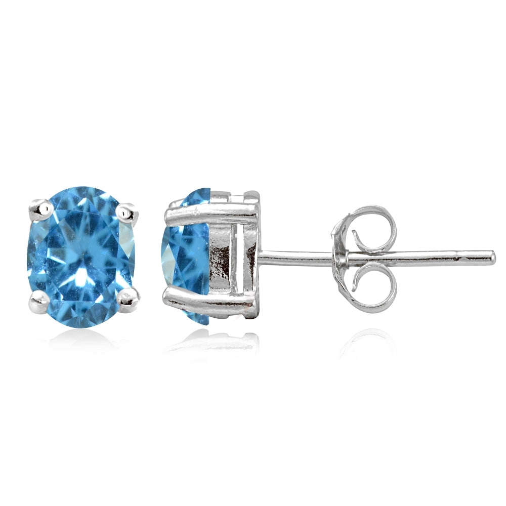 Sterling Silver Created Blue Topaz 7x5mm Oval Stud Earrings