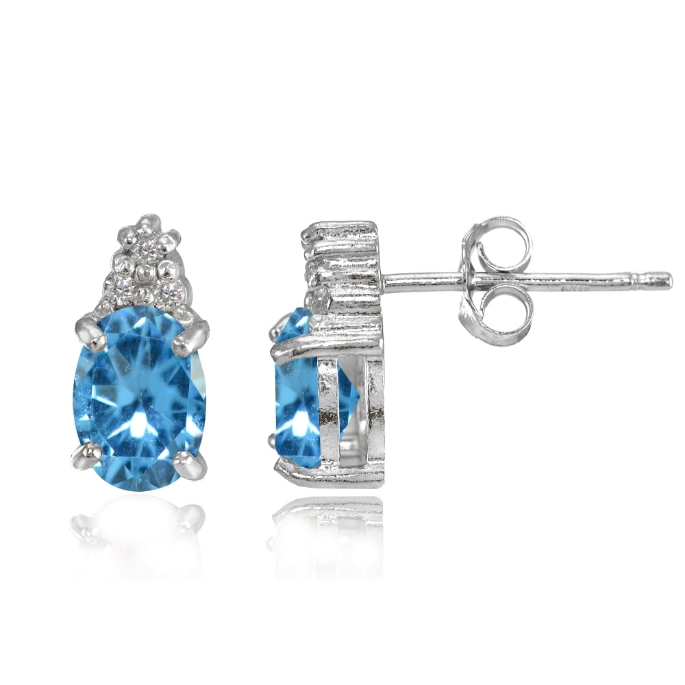 Sterling Silver Created Blue Topaz and CZ Accent Oval Stud Earrings