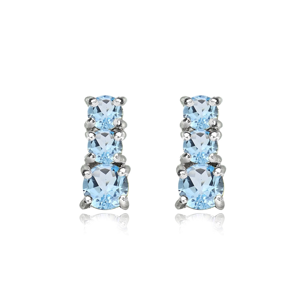 Sterling Silver Blue Topaz Round Graduating Three Stone Stud Earrings